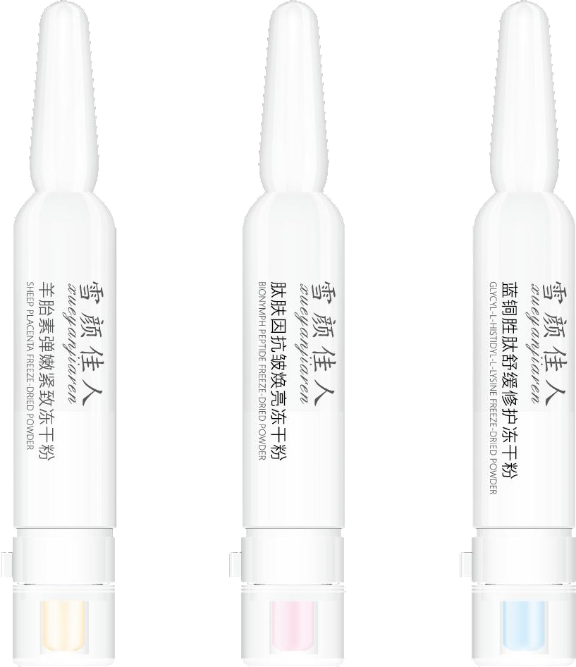 Photograph of three pen-shaped freeze-dried units with colour-coded lower sections